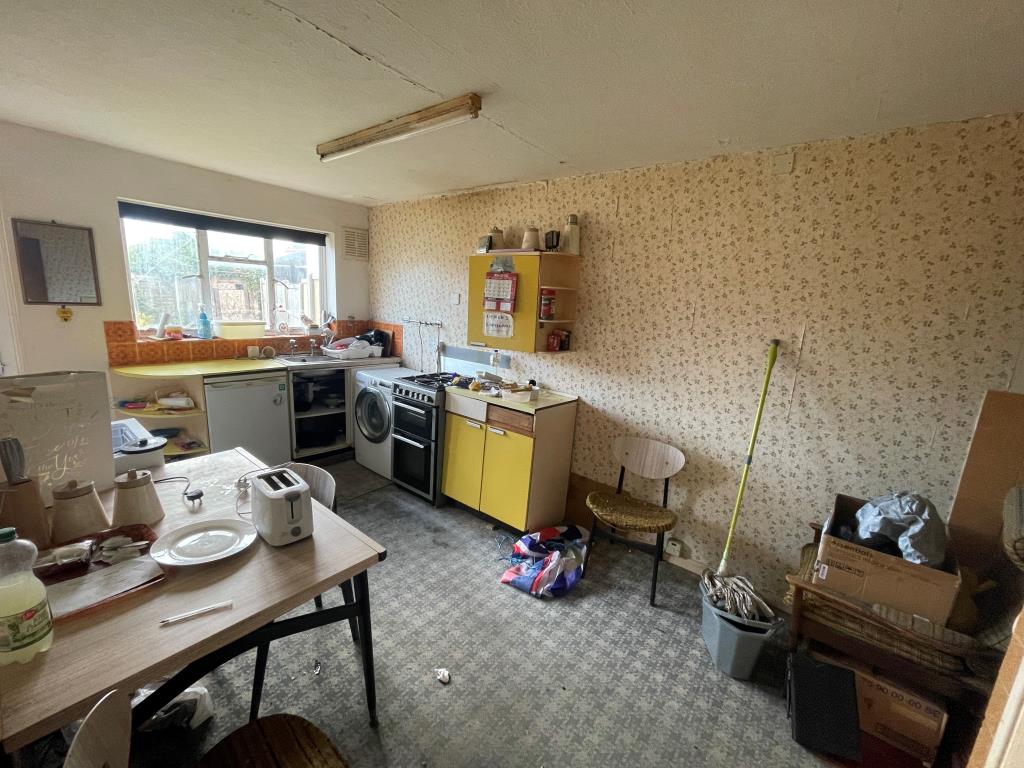 Lot: 6 - THREE-BEDROOM SEMI FOR REFURBISHMENT - Kitchen and dining table